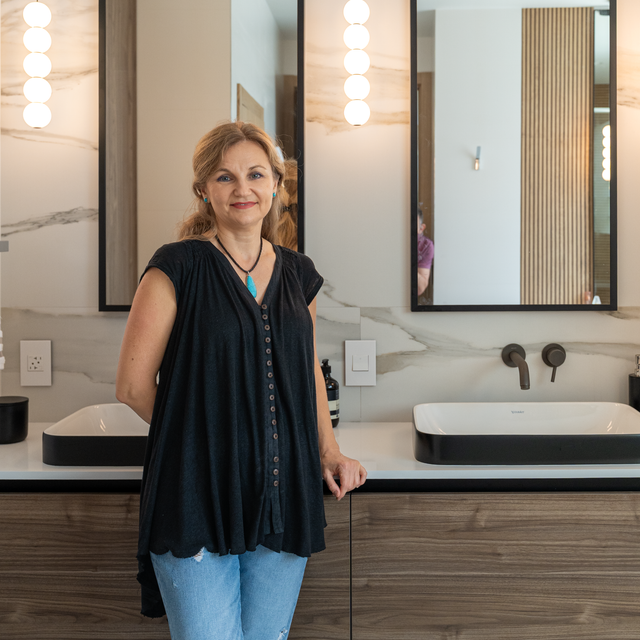 Elena S. in her completed bathroom